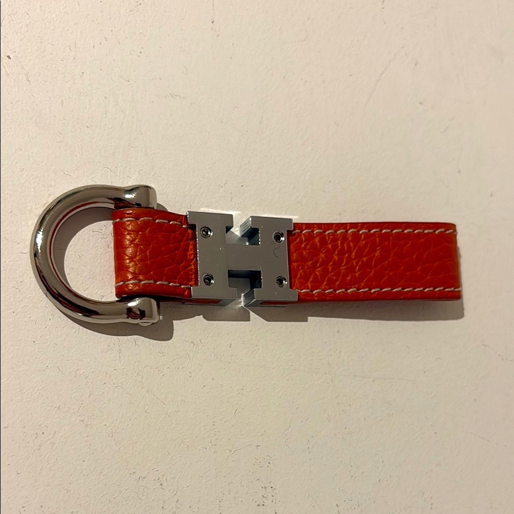 Vintage “H” Orange and Silver Hardware Horsebit Keychain.
